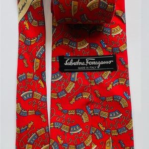 Vintage Salvatore Ferragamo silk tie in train print.